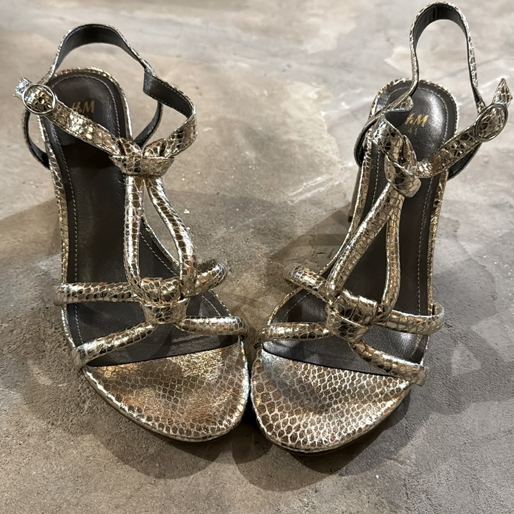 H&M Gold metalic with 3 inch block heel.